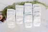 Photo of 12 Diaper Samples including Huggies Little Snugglers, Huggies Little Movers, Pampers Swaddlers and Pampers Cruisers in sizes newborn to 5