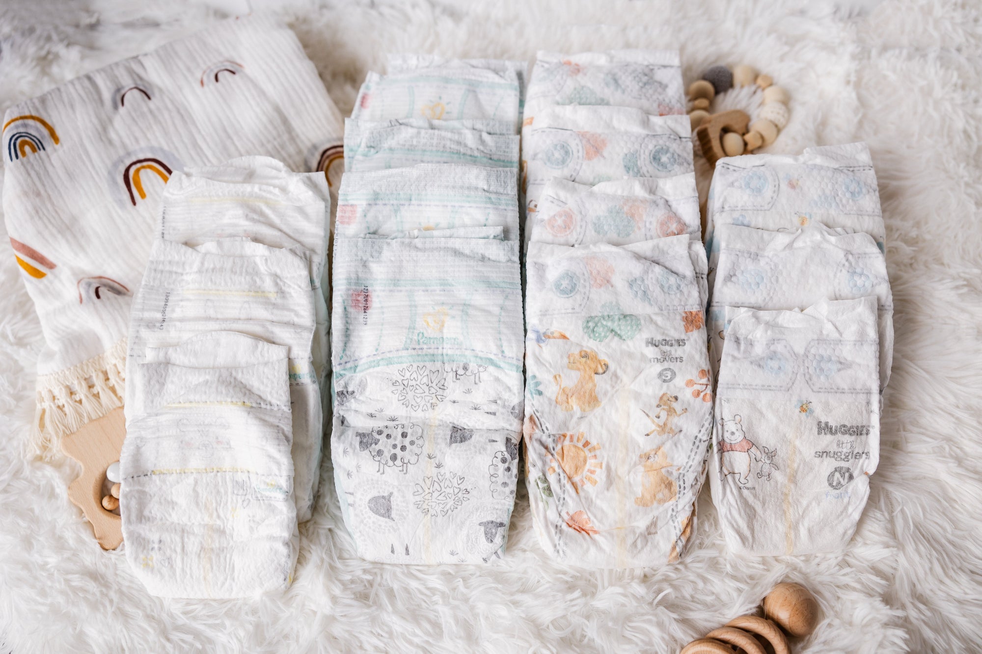Caregiver's Choice Diaper Sampler Package: 14 Diaper Sample Packs of diapers in every size including Huggies Little Movers, Pampers Cruisers, Huggies Little Snugglers and Pampers Swaddlers