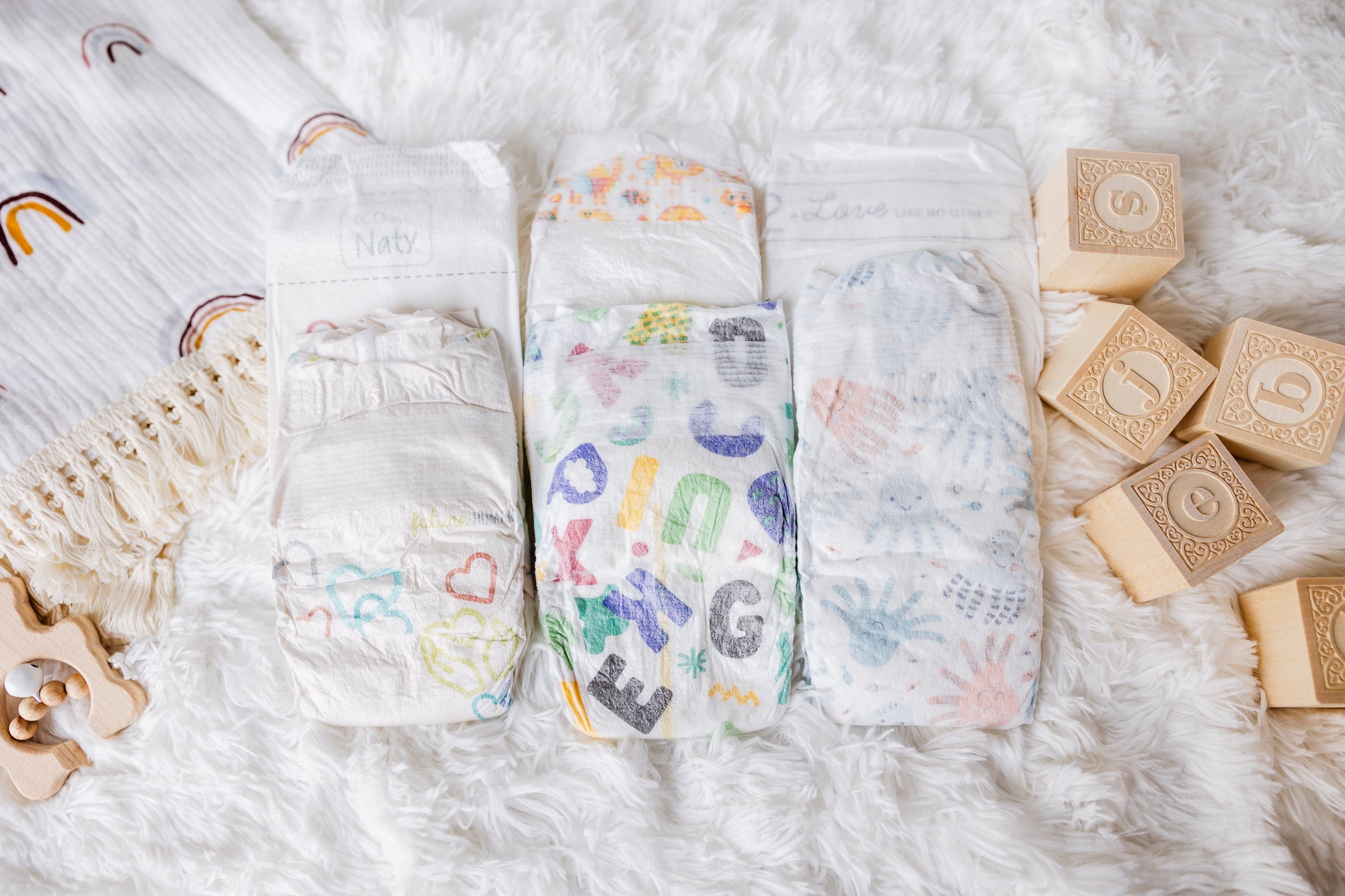 Mother Earth Diaper Sampler Package: 6 Diaper Sample Packs of size 1 eco-friendly diapers including ECO by Naty, Seventh Generation, Babyganics, Hello Bello, Bambo Nature and ABBY&FINN