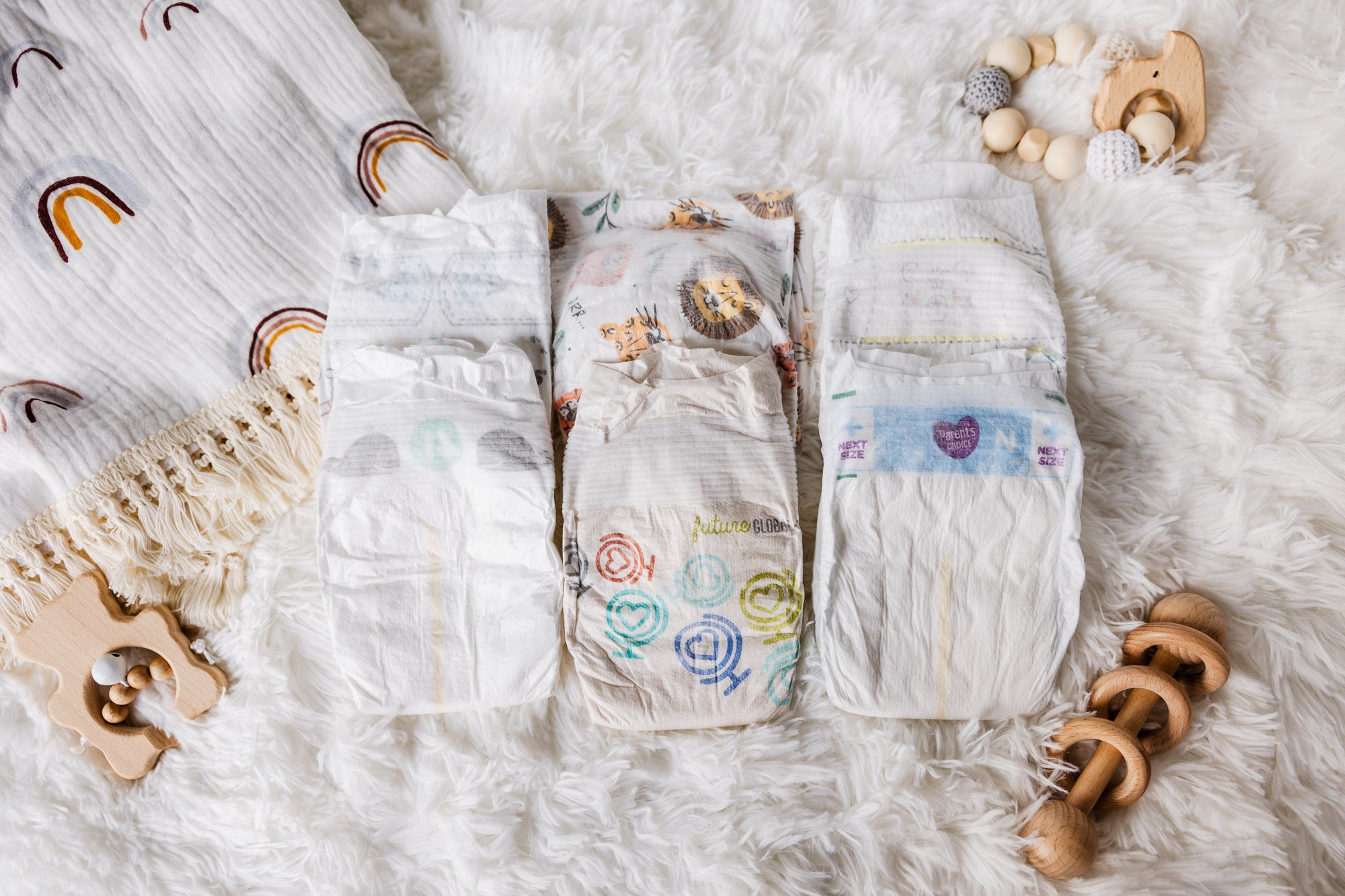Newborn Babes Diaper Sampler Package: 6 Diaper Sample Packs of newborn diapers including Huggies Little Snugglers, Pampers Swaddlers, Seventh Generation, Hello Bello, Up & Up and Parent's choice