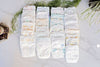 Photo of 24 Diaper Samples including Mama Bear, Kirkland Supreme, Up &amp; Up Parent&#39;s Choice, Bambo Nature, Babyganics, ABBY&amp;FINN, Earth&#39;s Best, Earth &amp; Eden, ECO by Naty, Seventh Generation, Pampers Pure Protection, Huggies Little Snugglers, Huggies Snug &amp;